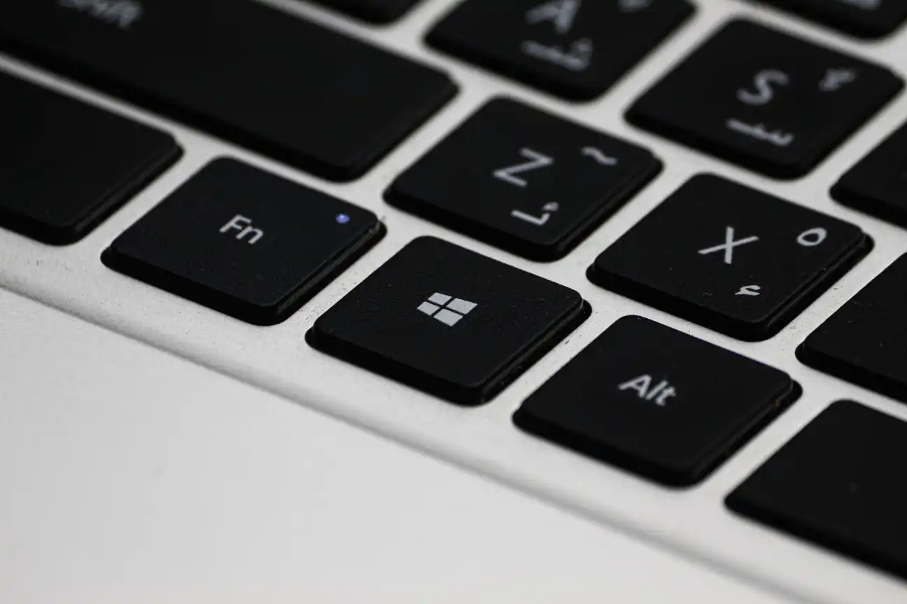 Laptop with a Linux terminal in a dark room